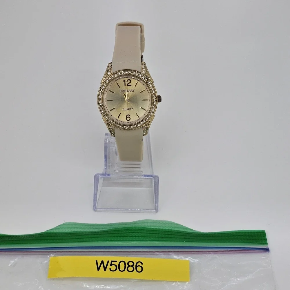 Embassy Women's Watch 34MM Gold Dial Cream Plastic Bands New Battery‎